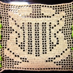 方眼レース編み[竪琴に絡む蛇]